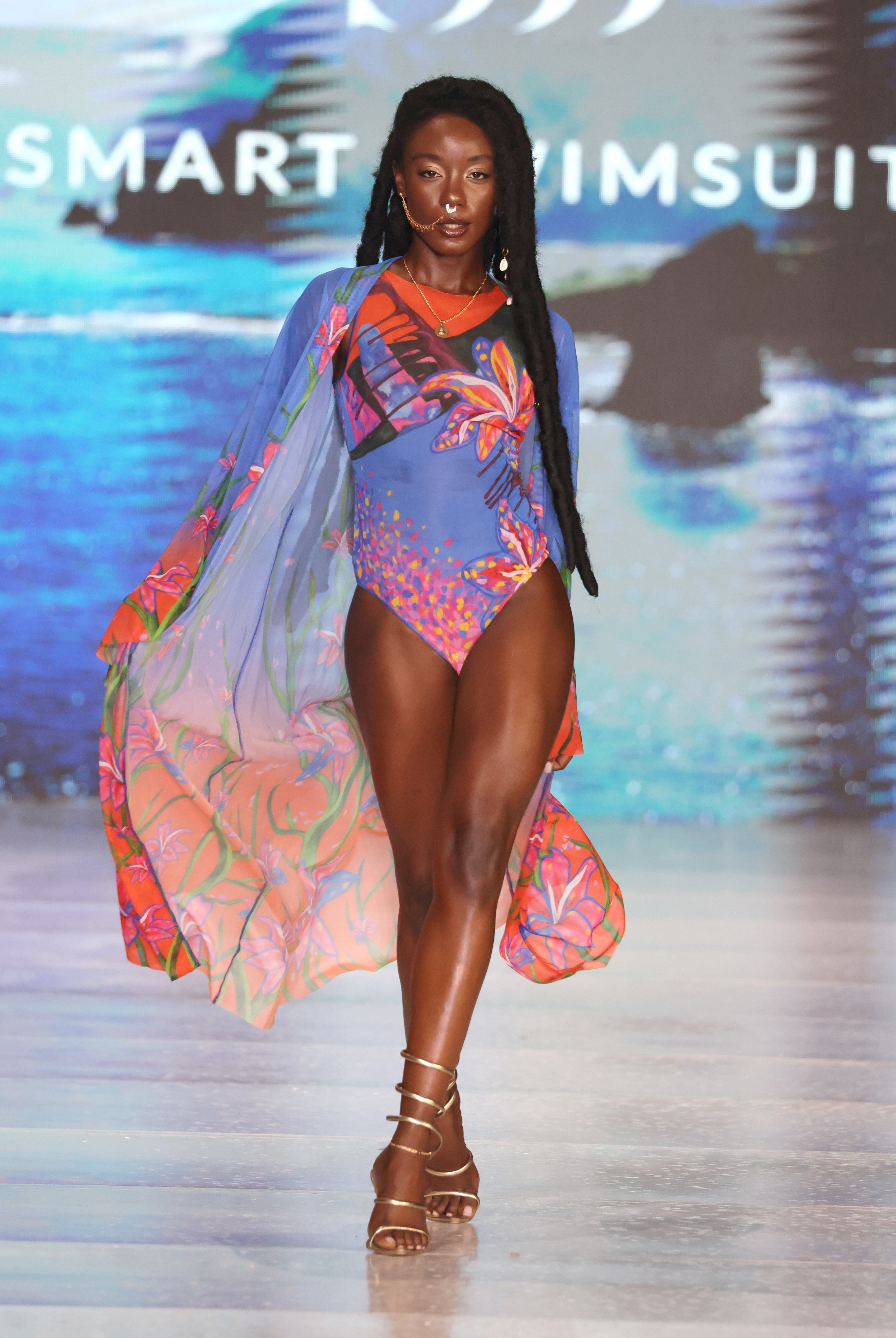 This text promotes a sustainable Lily print sleeveless swimsuit featuring SPF35 protection. It highlights the swimsuit's blend of classic luxury and eco-friendly style. The text encourages users to click to explore an innovative tan-through swimwear collection.