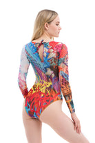 This file introduces the world's top sustainable smart swimsuit brand, showcasing a graffiti print one-piece with sleeves. Inspired by the runway, it offers innovative tan-through technology