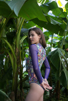  Discover chic and sustainable tan-through smart swimsuits in snake print. This sleeveless swimsuit offers SPF35 protection and is available at a discounted price for a limited time. Experience classic luxury today.