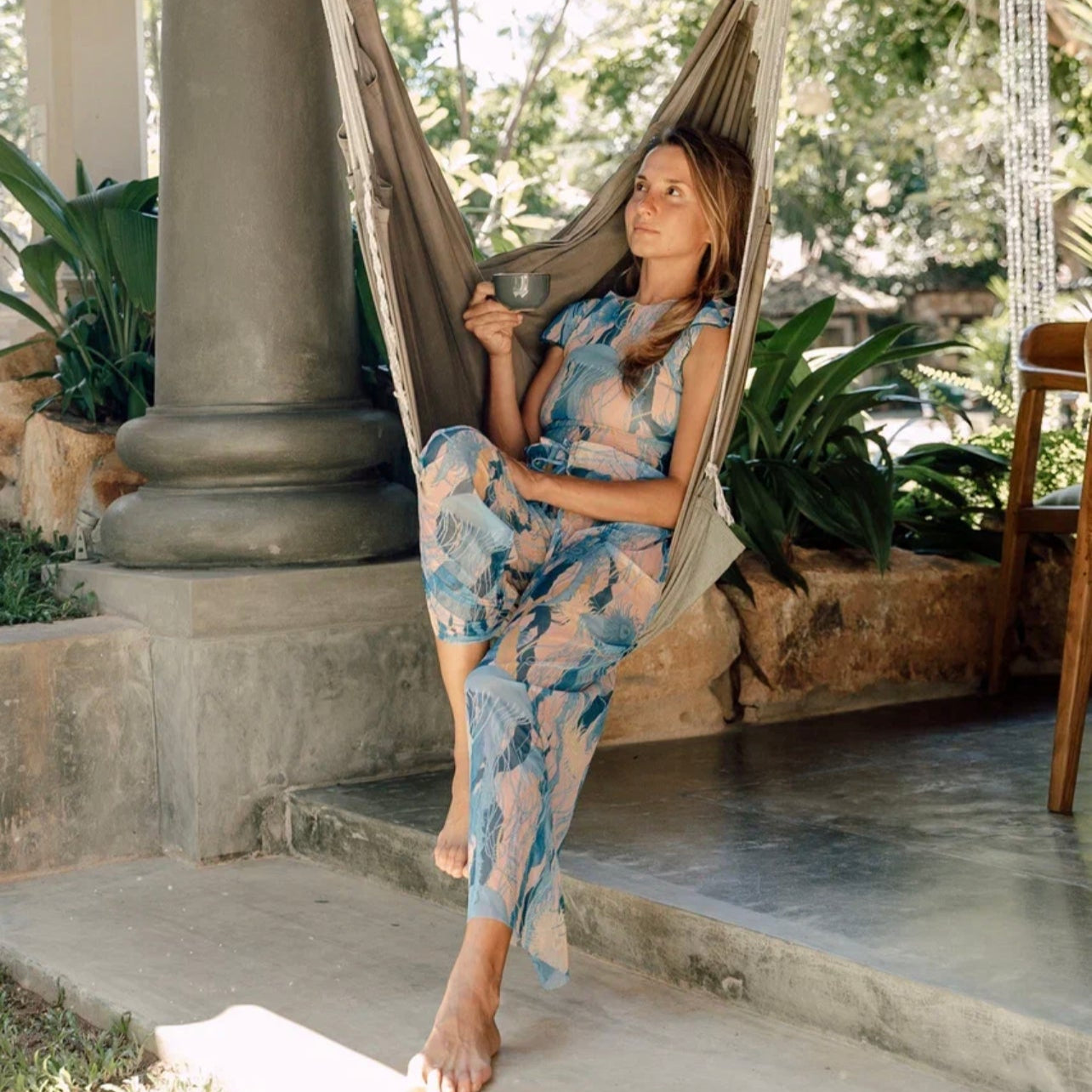 This file presents sustainable tan-through smart swimsuits adorned with a stylish Jellyfish print. Included are beach pants offering SPF15 protection, combining luxury with sun-safe comfort.