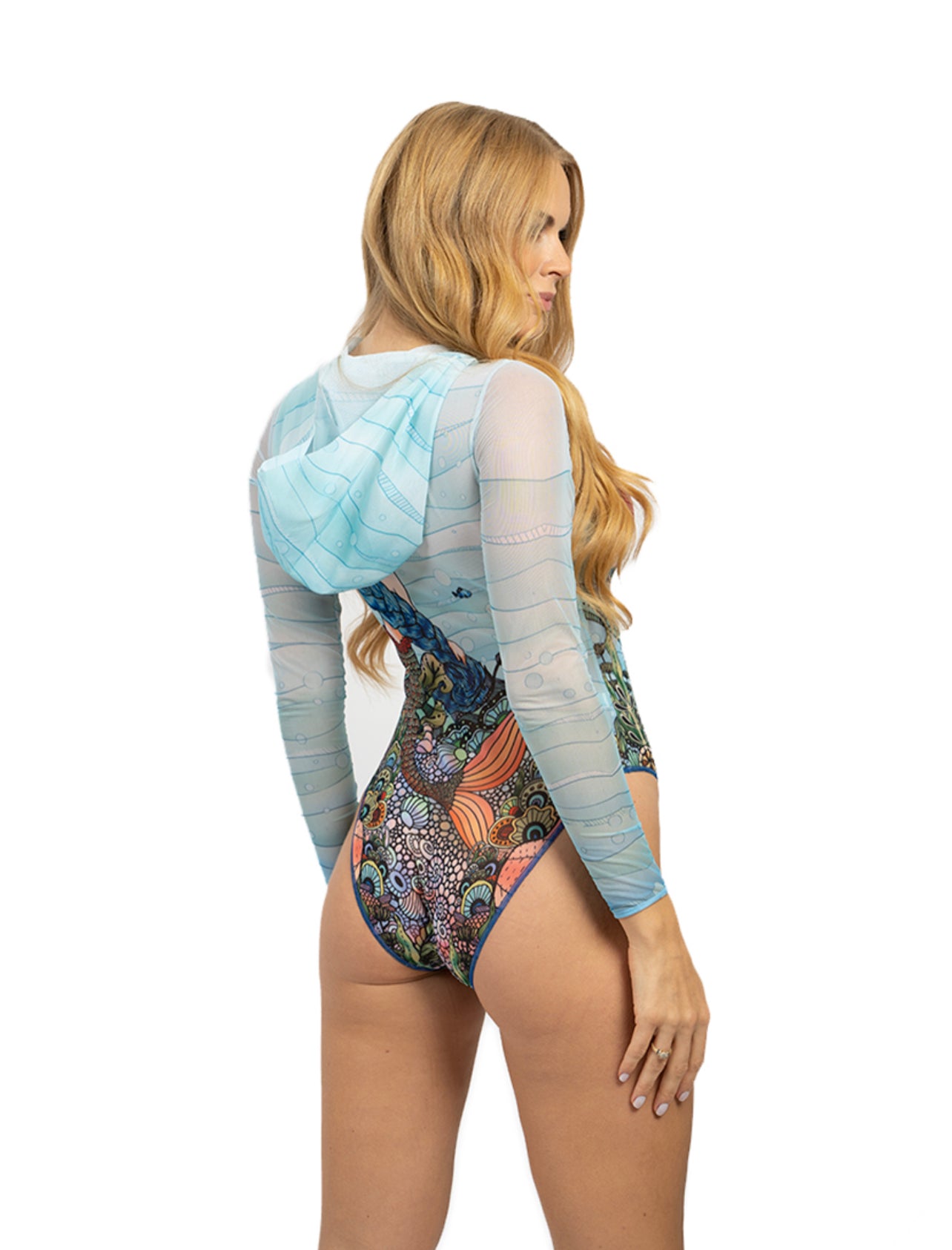 Explore our range of sustainable tan-through swimsuits with a charming mermaid print. This swimsuit offers SPF35 protection and comes with a stylish hood and lace detail for a touch of elegance.