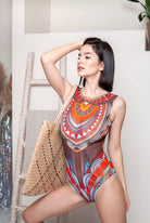 This file provides a succinct overview of a sustainable and fashionable smart swimsuit, showcasing the Africa print. It's a sleeveless one-piece with tan-without-tan-lines technology, suitable for individuals with visual impairment or low-bandwidth connections