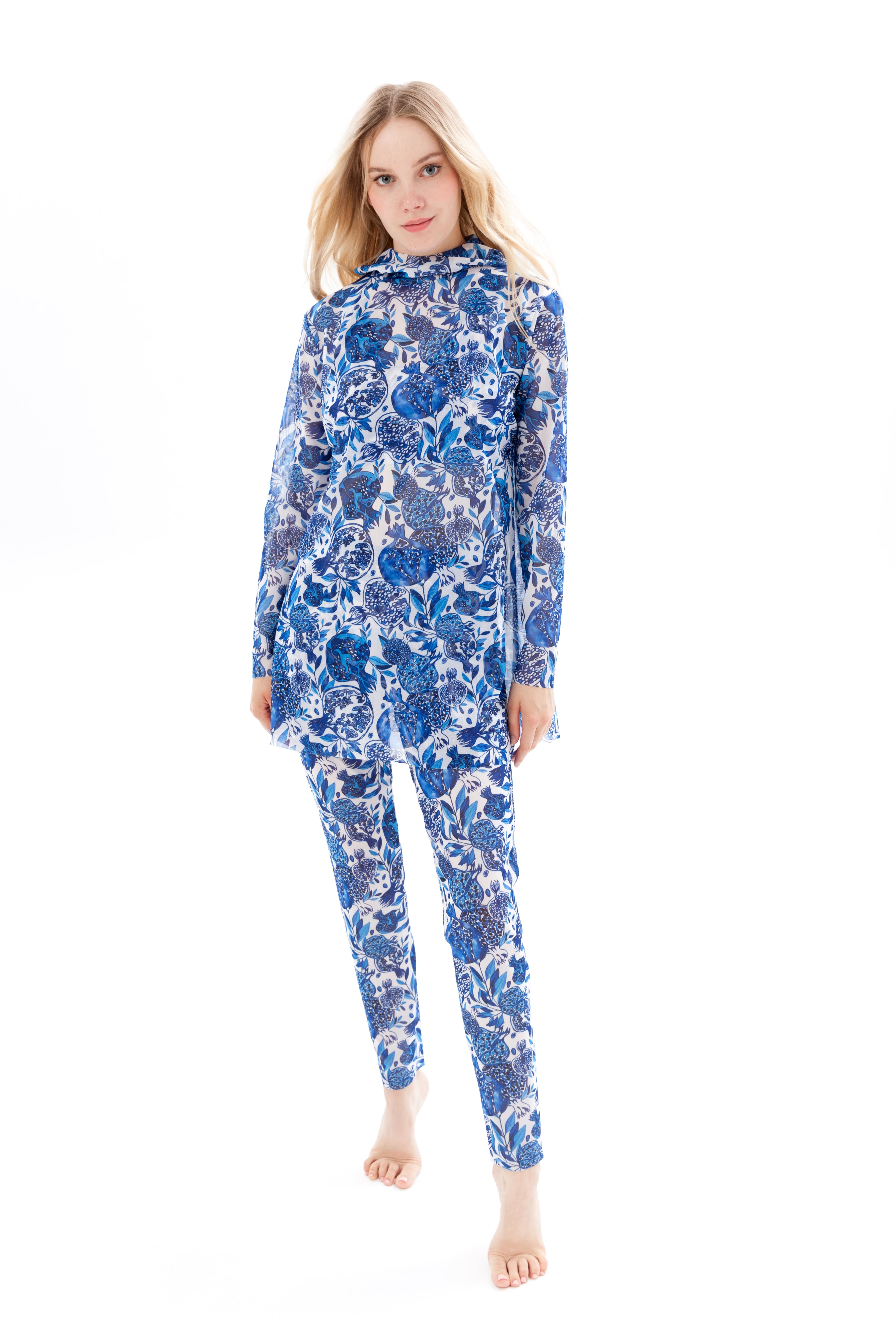 Explore our Pomegranate print burkini set, featuring a top, leggings, and tunic. Designed for classic luxury and modest fashion, this sustainable swimwear offers style and eco-friendly comfort. Shop now!