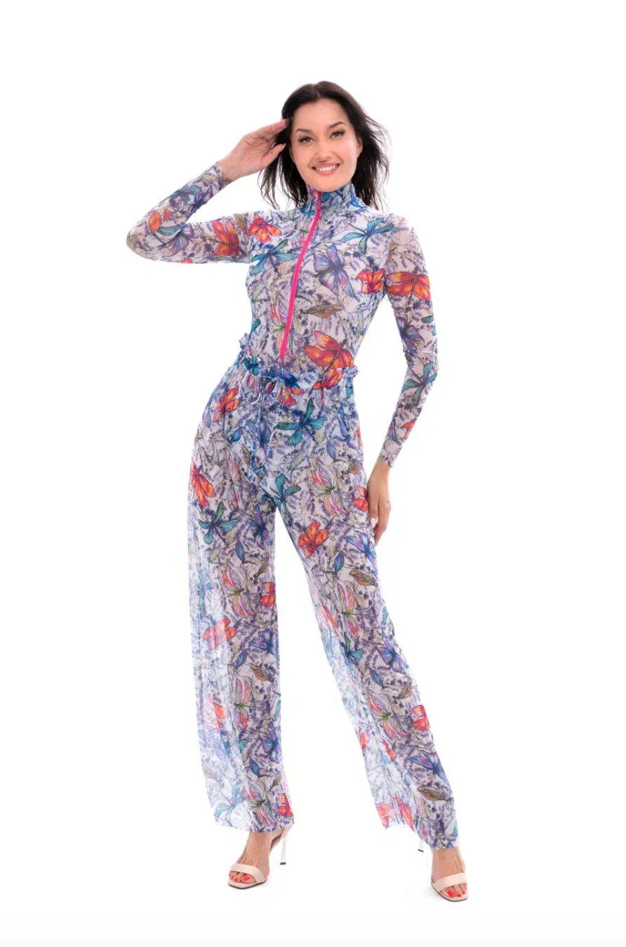 Explore sustainable tan-through smart swimwear adorned with a dragonflies print in this file. Featuring beach pants showcased at Hawaii Fashion Week, it offers stylish and eco-friendly beachwear options