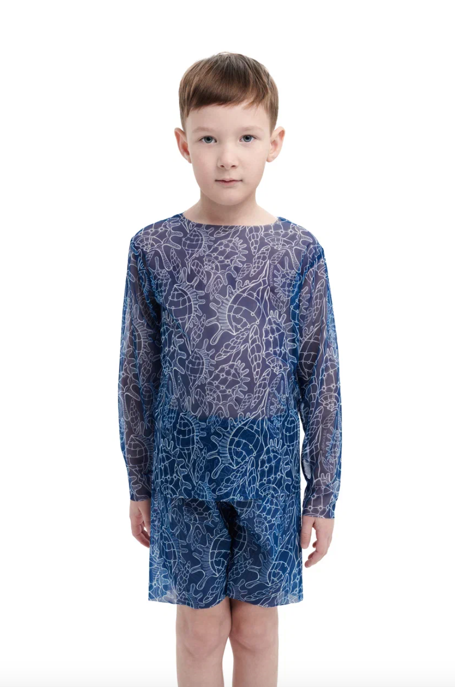 Explore our Shells print Kid's Smart T-shirt and Shorts with SPF35 protection. This file features eco-friendly swimwear, blending classic luxury and safety to provide stylish and secure beachwear for your child. Shop now!