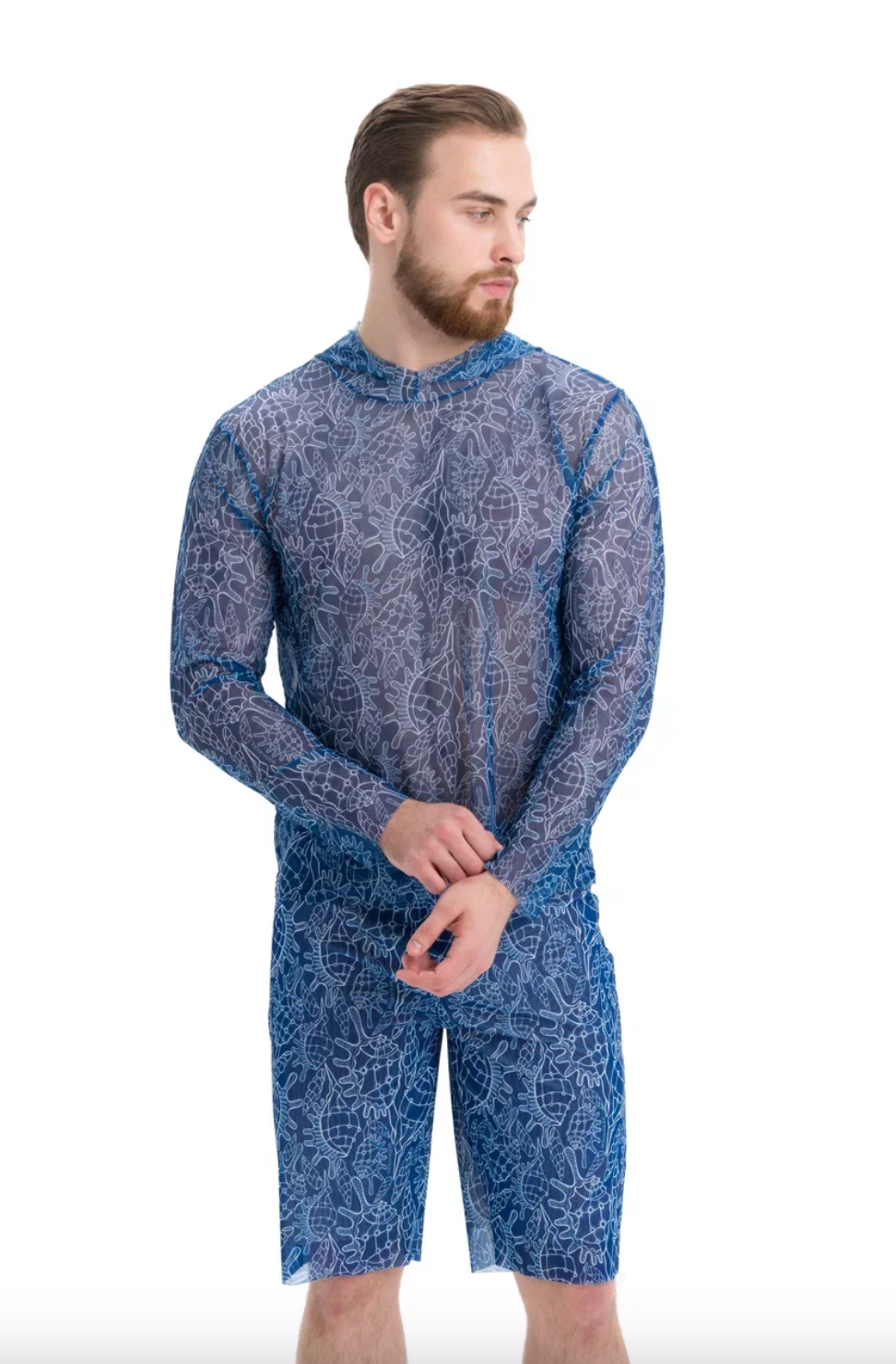 This file contains a description of a tan-through, sustainable Men's Smart T-shirt with and without Hood in SHELLS print. It provides innovative SPF protection and classic luxury for modest fashion. Shop now!