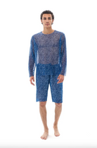 This file contains a description of tan-through, innovative, sustainable Men's Smart Swim Trunks Bermudas in SHELLS print. It offers classic luxury for modest fashion. Shop now!