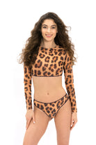 This file showcases innovative tan-through smart swimsuits adorned with the iconic leopard print. Featuring a two-piece design with a Brazilian bikini, it offers stylish and enjoyable options for summer