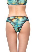 Explore a collection of classic luxury tan-through swimsuits in a vibrant fish print. Featuring SPF35 protection, these classic bikinis offer both style and sun safety for beach enthusiasts. Click to shop now!