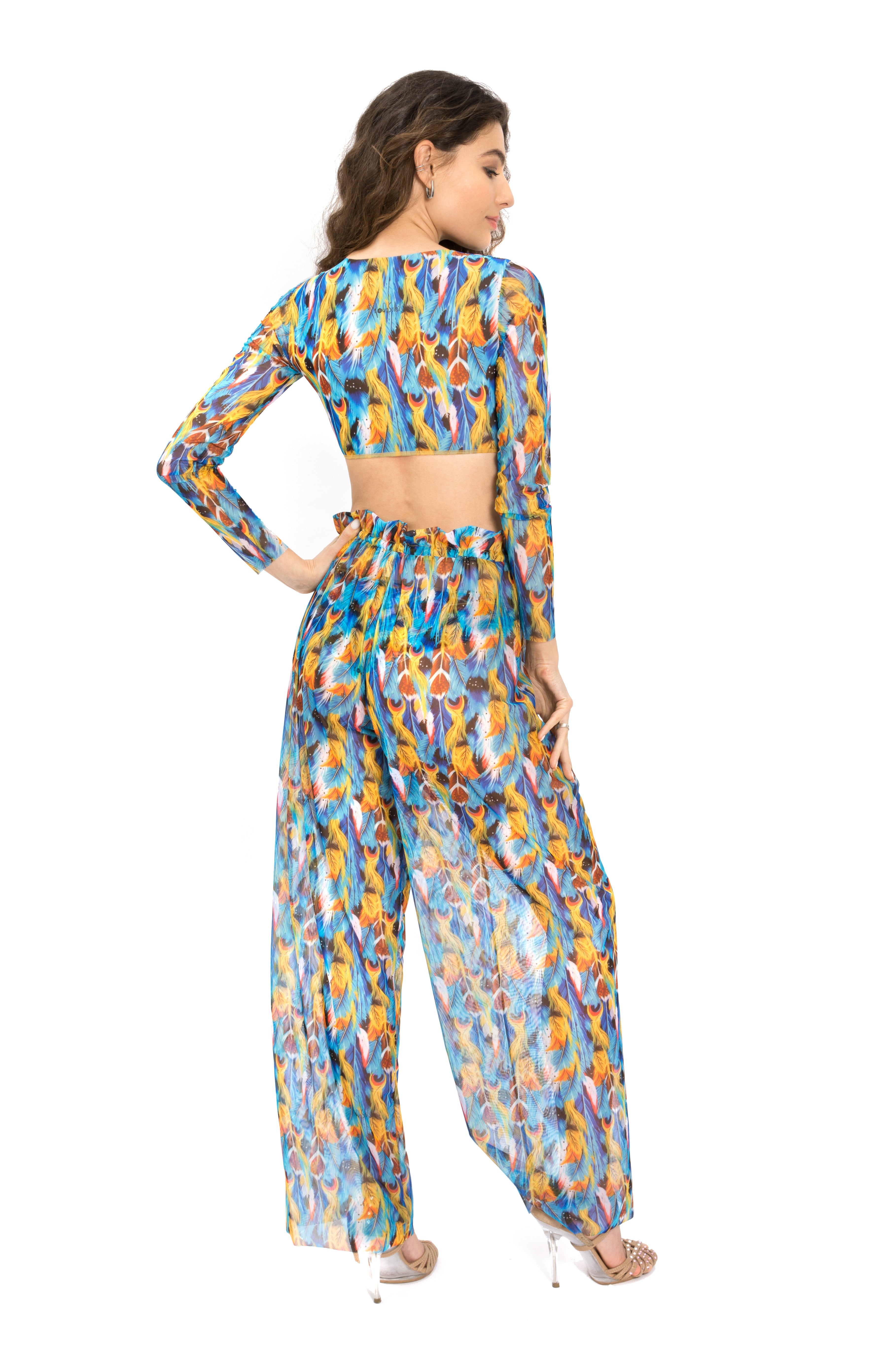 This file presents luxury smart swimsuits from our brand, adorned with a fashionable feather print. Designed for summer, these beach pants feature tan-through fabric and SPF 15 protection, ensuring both style and functionality