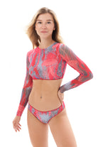 This file offers a variety of sustainable smart swimsuits with JELLYFISH pink print, including tops with sleeves and SPF35 protection, ensuring classic luxury and sun safety for your beach adventures.